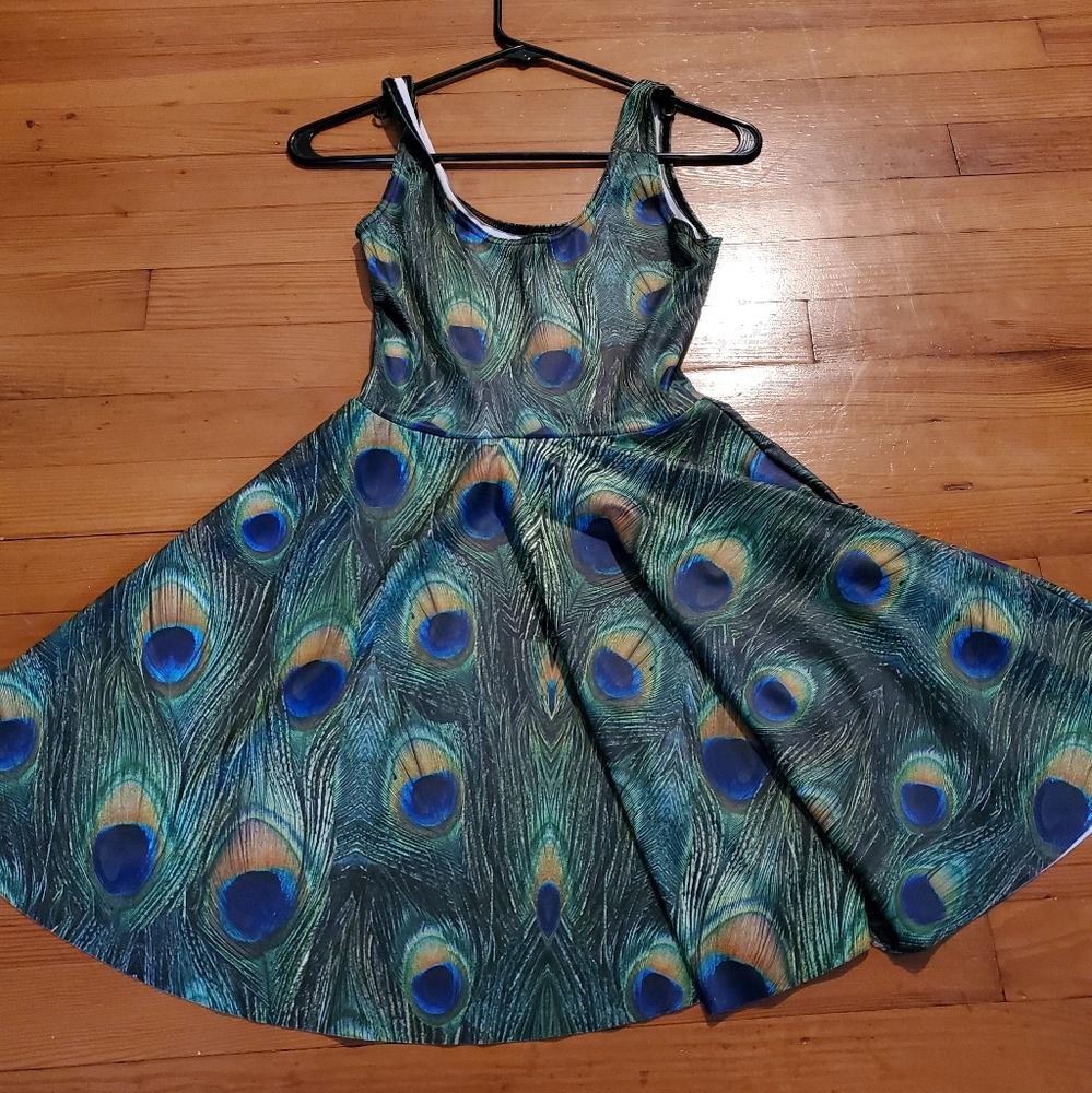 Peacock scoop skater